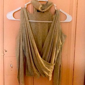 A large size shirt with open shoulders and low cut